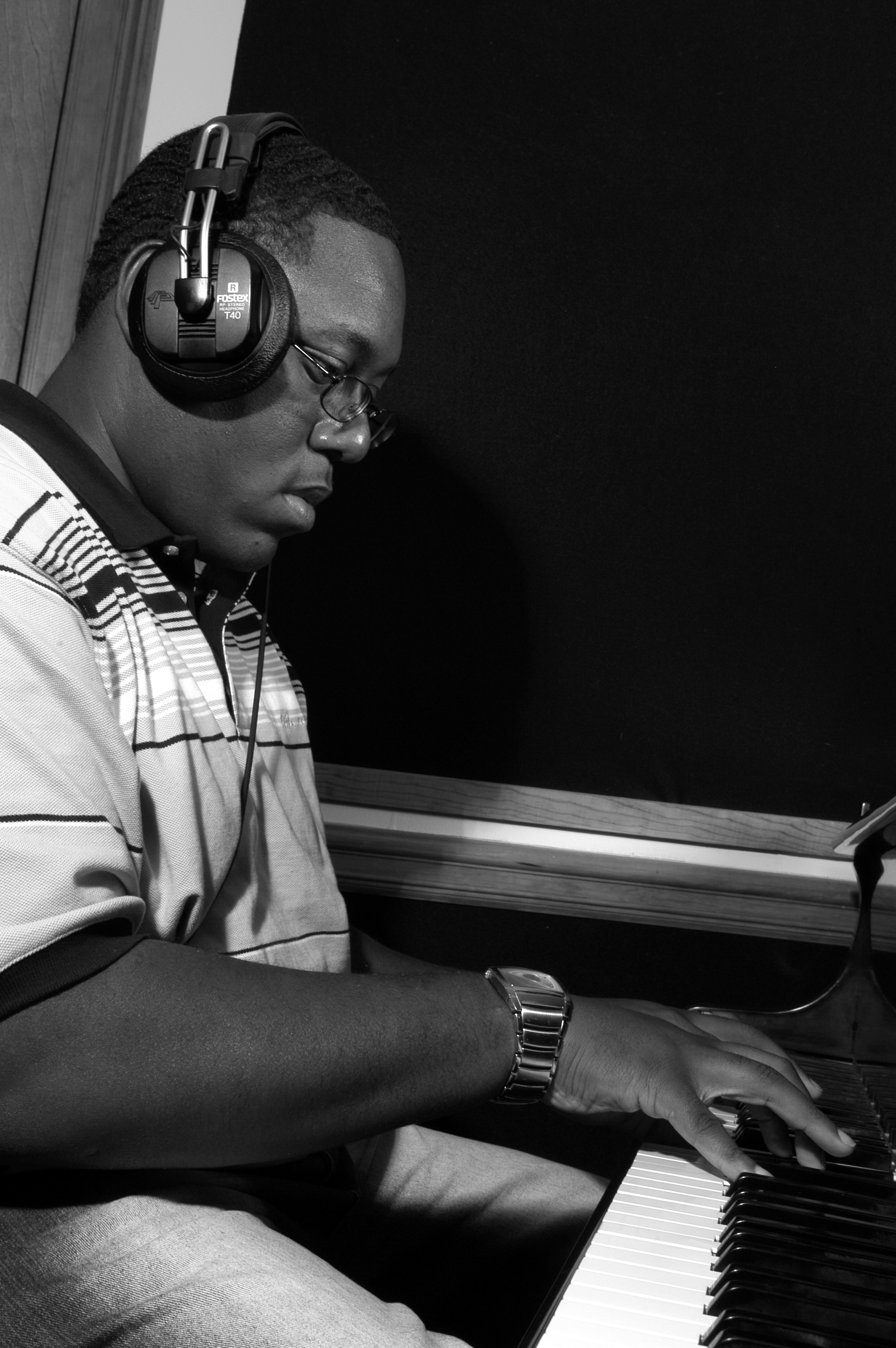 Kenneth Bryant II close up at piano — Dogwood Studios